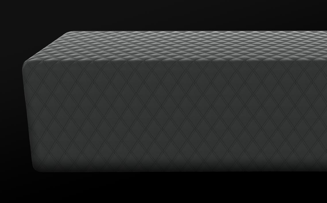 Photo of the SONU Comfort Insert Pillow in dark grey fabric on a black background.