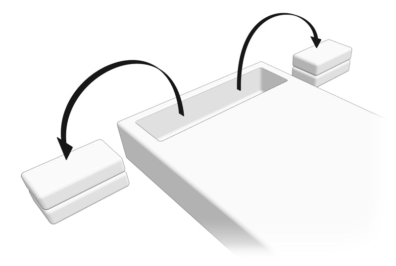 A computer rendering showing to temporarily remove the Support Pillows from the Comfort Chanel of the SONU, denoted by arrows arcing to the sides of the mattress.