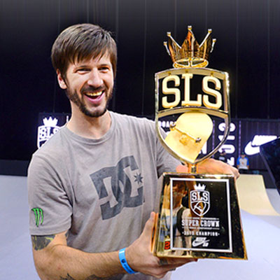 Photo of Pro Skateboarder Chris Cole with his trophy